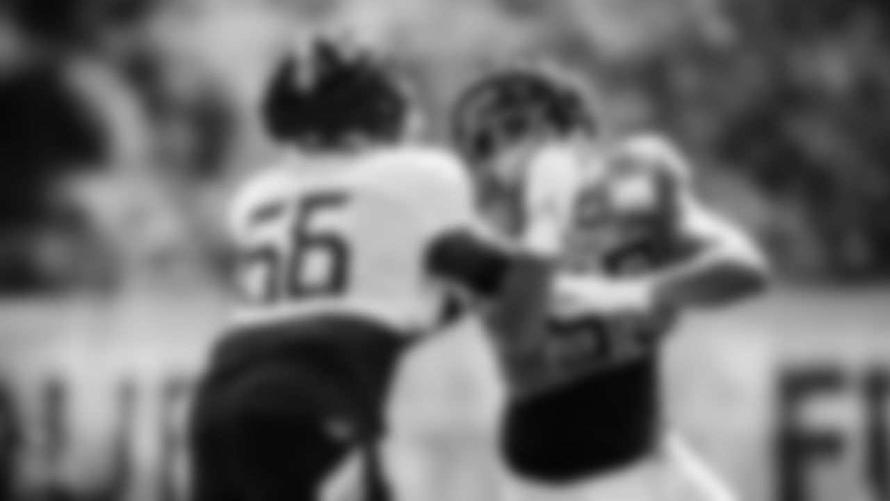 Offensive Lineman Chris Hubbard #66 of the Tennessee Titans and Outside linebacker Rashad Weaver #99 of the Tennessee Titans during fall camp practice at the Ascension Saint Thomas Sports Park in Nashville, TN. Photo By Donald Page/Tennessee Titans