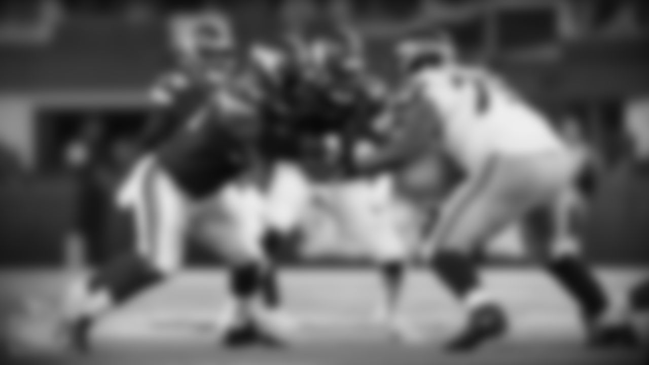 Minnesota Vikings defensive end Ifeadi Odenigbo (95) and outside linebacker Reshard Cliett (43) rush against Seattle Seahawks offensive tackle Elijah Nkansah (75) during an NFL preseason football game on Sunday, Aug. 18, 2019, in Minneapolis. The Vikings defeated the Seahawks, 25-19. (Ryan Kang via AP)