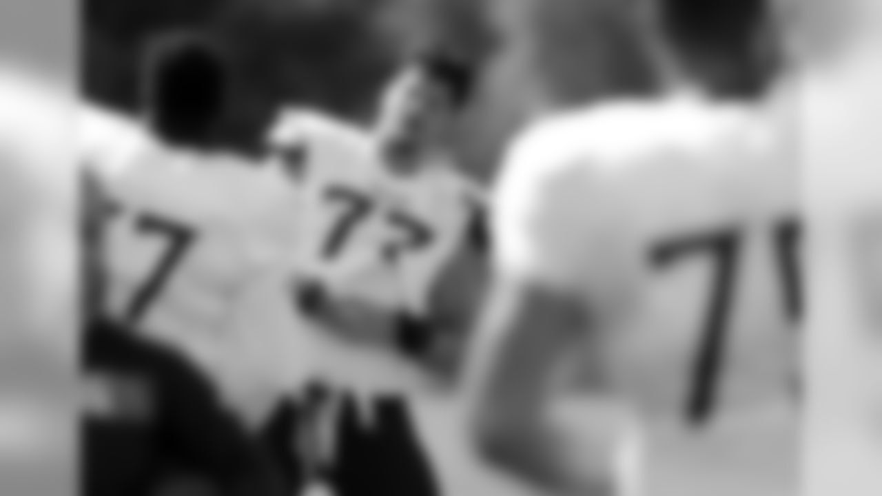 Tennessee Titans offensive tackle Taylor Lewan (77) warms up during NFL football training camp Saturday, July 28, 2018, in Nashville, Tenn. (AP Photo/Mark Humphrey)