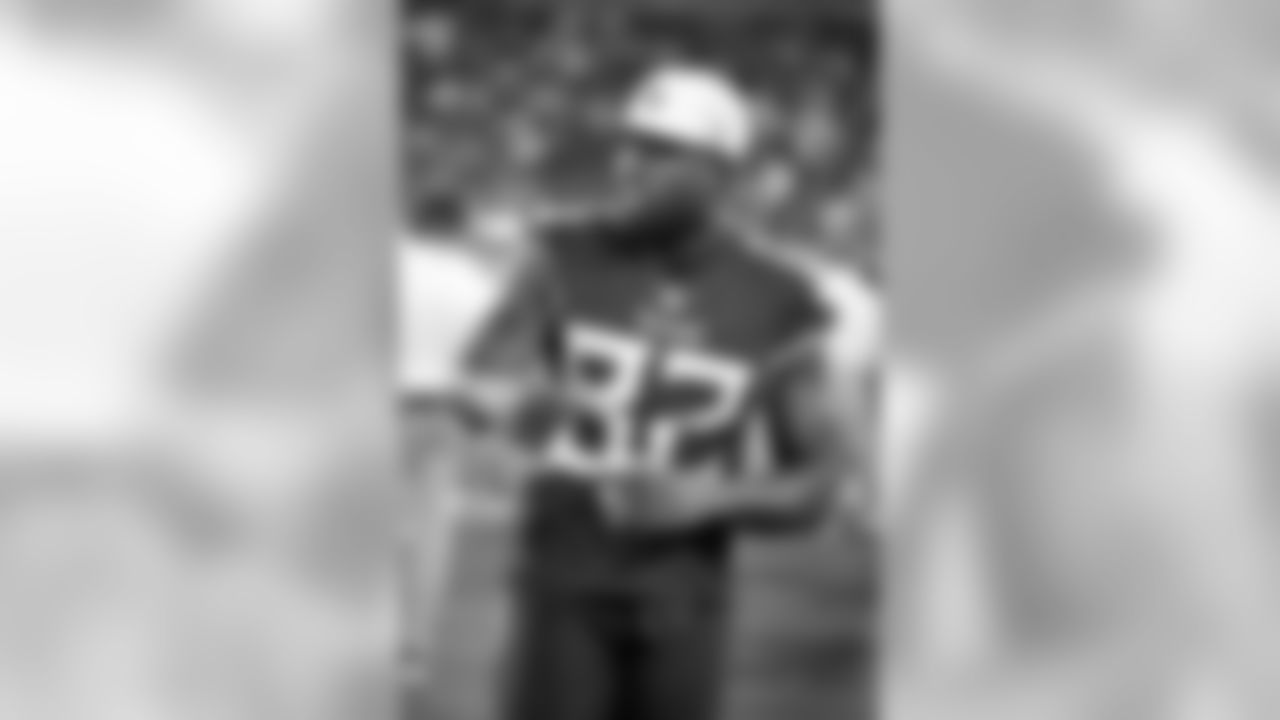 Tennessee Titans tight end Delanie Walker watches from the sideline in the first half of a preseason NFL football game between the Titans and the Minnesota Vikings Thursday, Aug. 30, 2018, in Nashville, Tenn. (AP Photo/James Kenney)