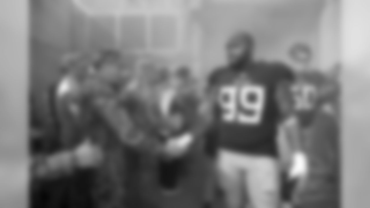 Tennessee Titans defensive end Jurrell Casey (99) shakes hands with a soldier before an NFL football game between the Titans and the New England Patriots Sunday, Nov. 11, 2018, in Nashville, Tenn. (AP Photo/James Kenney)