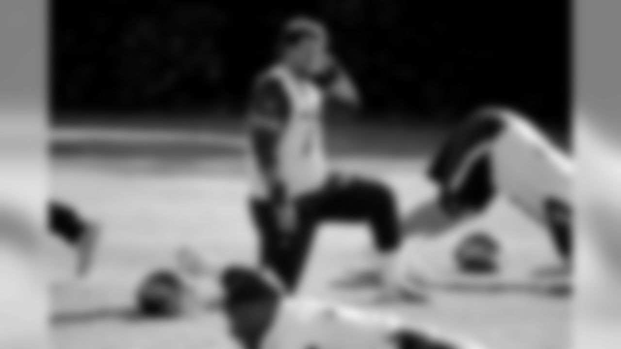 Tennessee Titans' offensive tackle Taylor Lewan stretches during an NFL training session at Syon House, in Syon Park, south west London, Friday, Oct. 19, 2018. The Tennessee Titans are preparing for an NFL regular season game against the Los Angeles Chargers in London on Sunday. (AP Photo/Matt Dunham)
