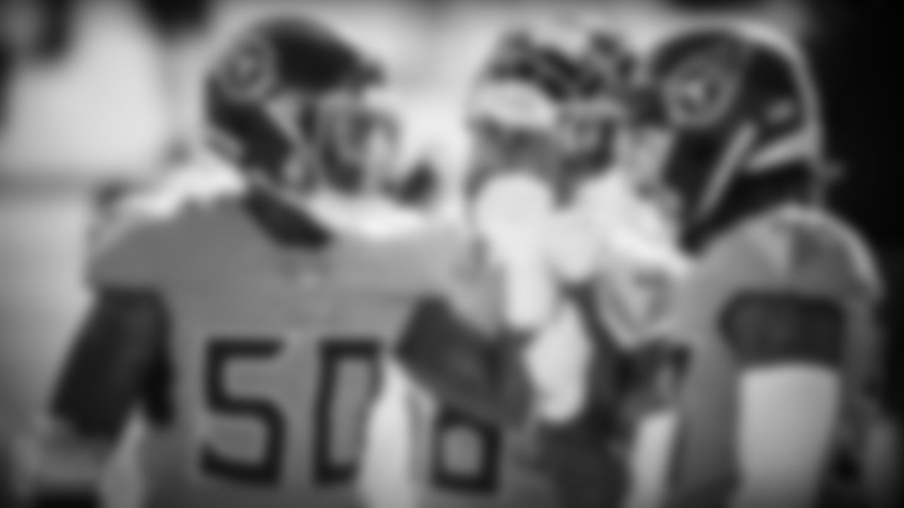 Outside linebacker Derick Roberson #50 of the Tennessee Titans, Harold Landry III #58, Wyatt Ray #57 huddle up prior to the game between the Tennessee Titans and the Chicago Bears at Nissan Stadium on NOVEMBER 08, 2020 in Nashville, TN. Photo By Caleb Jones/Tennessee Titans