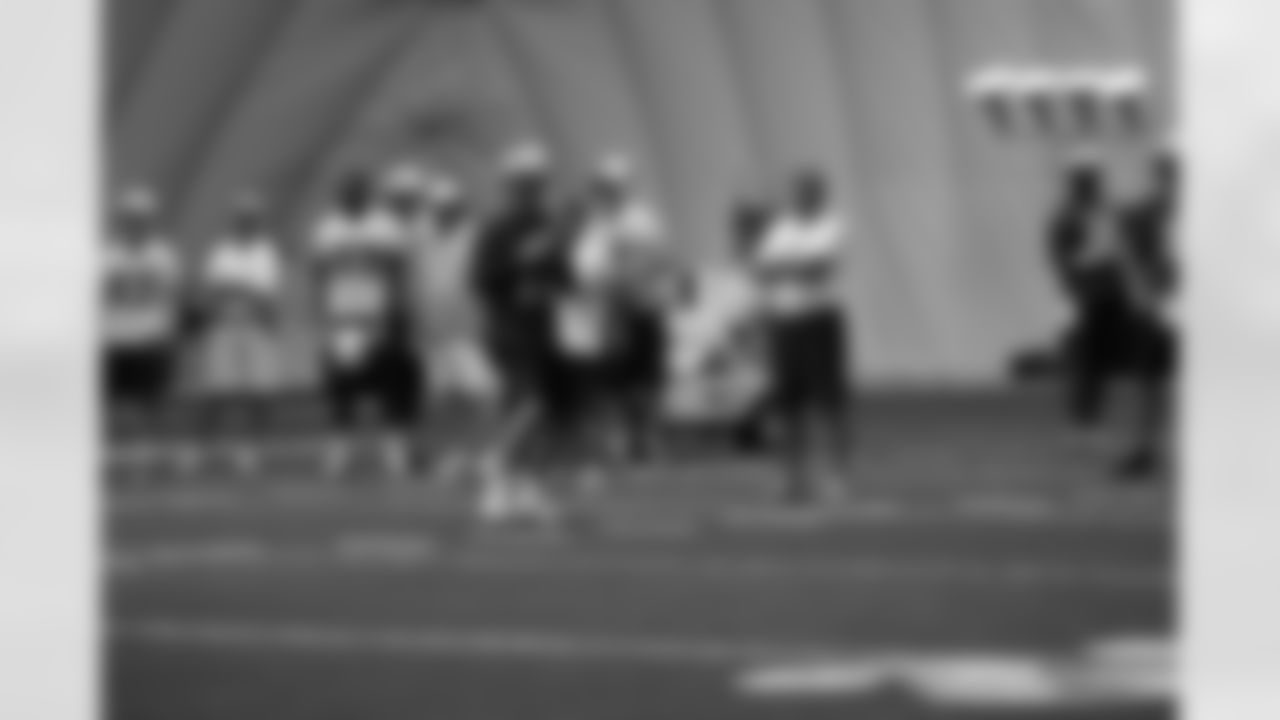 Titans players practice inside during Tuesday's organized training activity (OTA) at Baptist Sports Park in Nashville, Tenn.