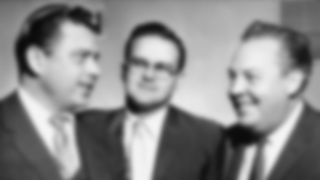 * ADVANCE FOR WEEKEND EDITIONS, AUG. 29-30 -- FILE -- * This Jan. 26, 1960, file photo shows American Football League president Lamar Hunt, center, flanked by Bud Adams, left, owner of the Houston AFL team, and Harry Wismer, owner of the New York AFL team, in Dallas. (AP Photo/File)
