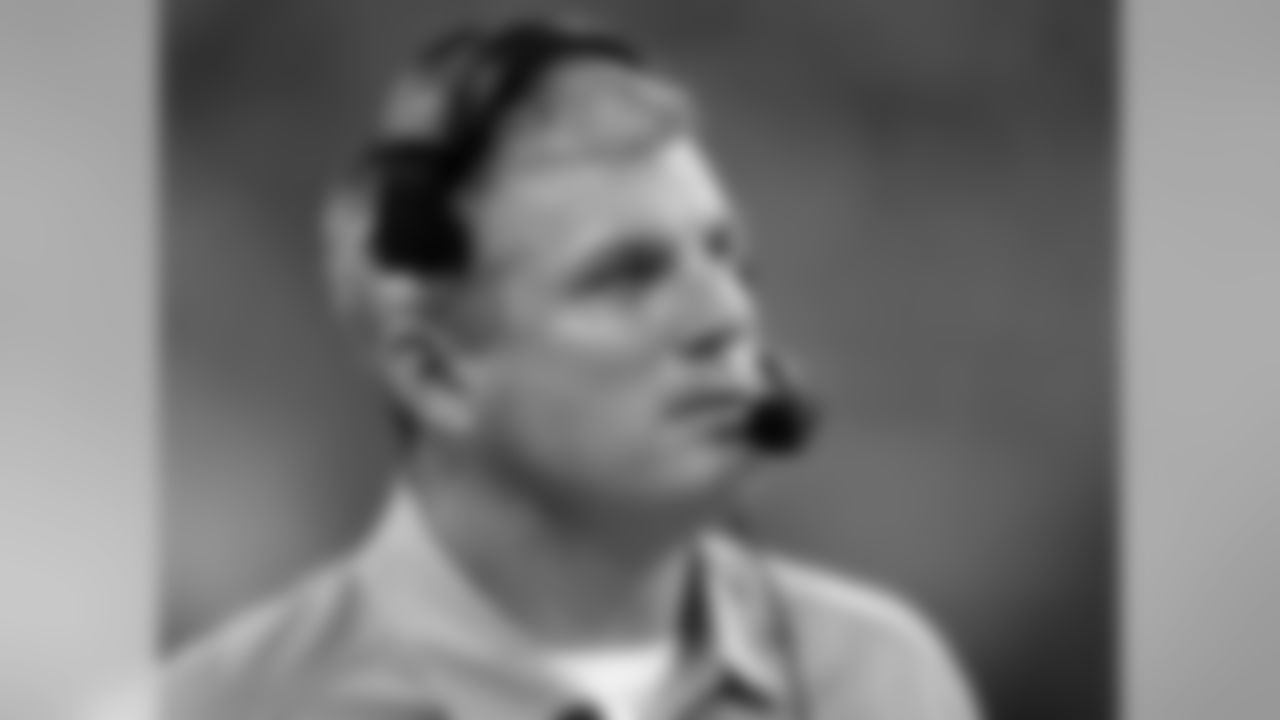 Tennessee Titans head coach Mike Munchak watches a replay during the first half of an NFL football game against the Indianapolis Colts, Sunday, Dec. 9, 2012, in Indianapolis. (AP Photo/Darron Cummings)