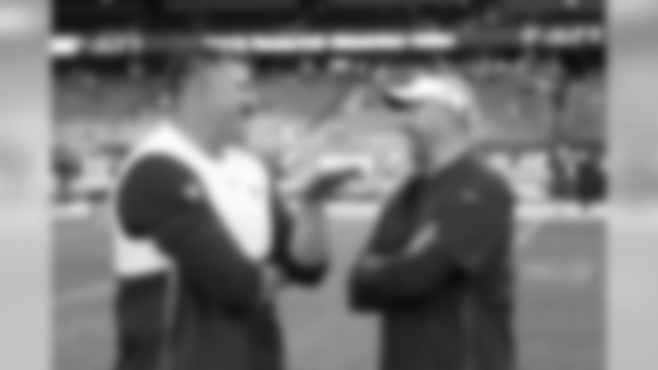 Tennessee Titans head coach Mike Vrabel talks with Chicago Bears head coach Matt Nagy before an NFL preseason football game, Thursday, Aug. 29, 2019, in Chicago. (AP Photo/Charles Rex Arbogast)