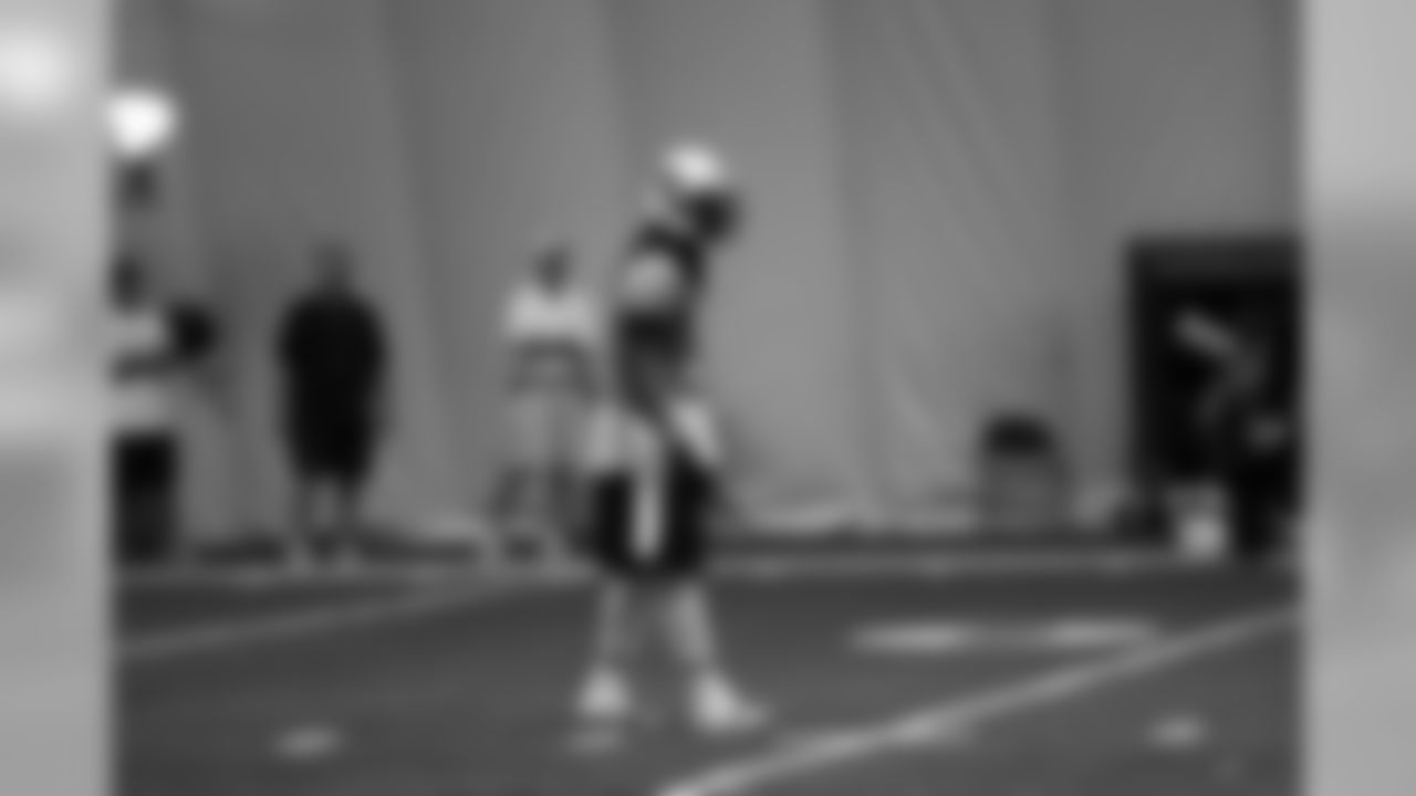 Titans players practice inside during Tuesday's organized training activity (OTA) at Baptist Sports Park in Nashville, Tenn.