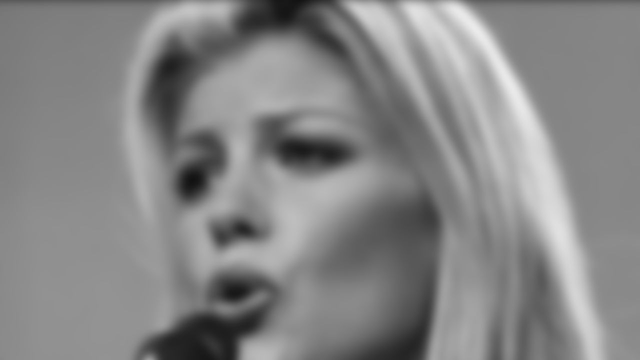 Singer Faith Hill sings the National Anthem before the St. Louis Rams 23 - 16 victory over the Tennessee Titans in Super Bowl XXXIV on January 30, 2000 at the Georgia Dome in Atlanta, Georgia. (Al Messerschmidt via AP)