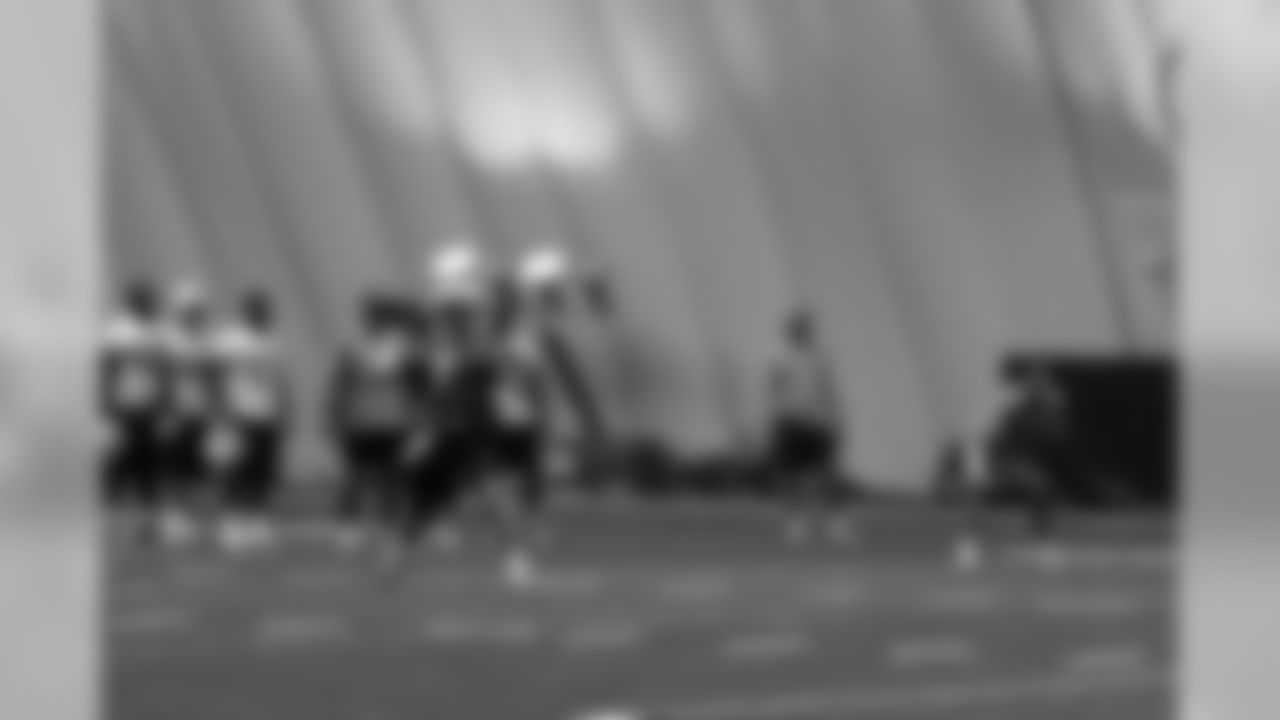Titans players practice inside during Tuesday's organized training activity (OTA) at Baptist Sports Park in Nashville, Tenn.