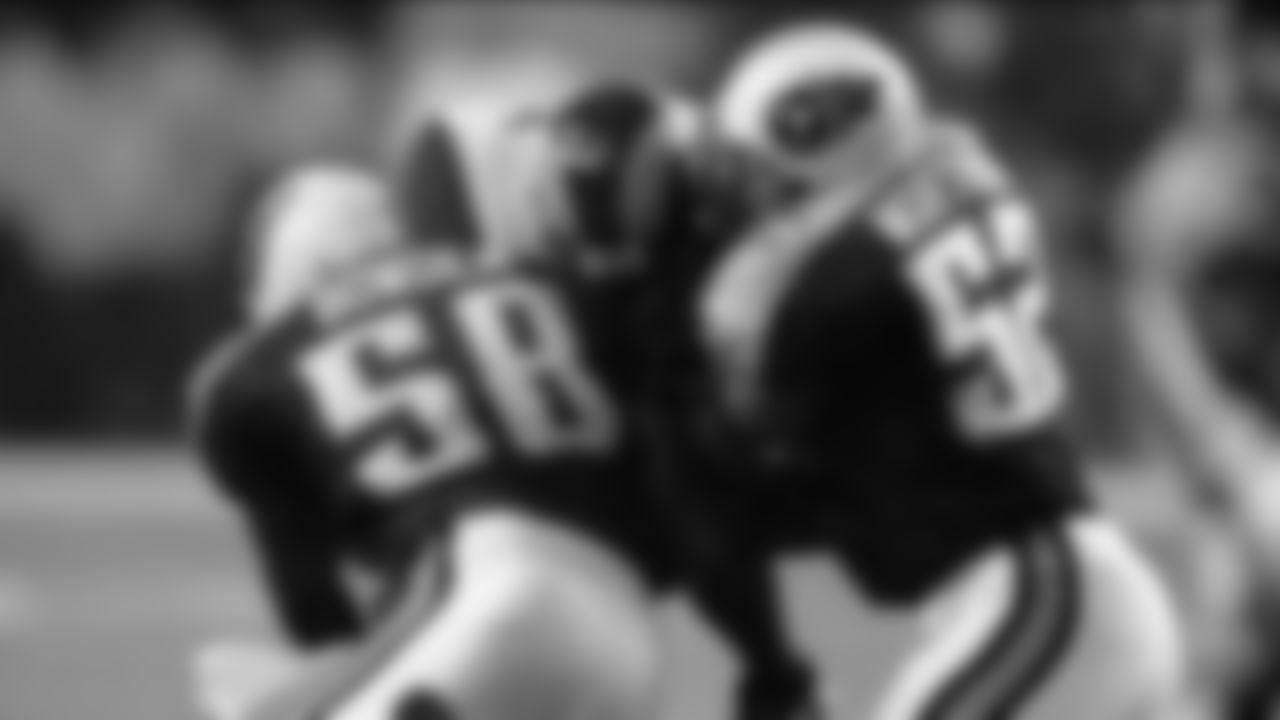 Tennessee Titans linebackers Joe Bowden (58) and Barron Wortham (52) are seen in action during Super Bowl XXXIV Jan. 30, 2000, at the Georgia Dome in Atlanta. The Rams defeated the Titans 23–16. (Allen Kee via AP)