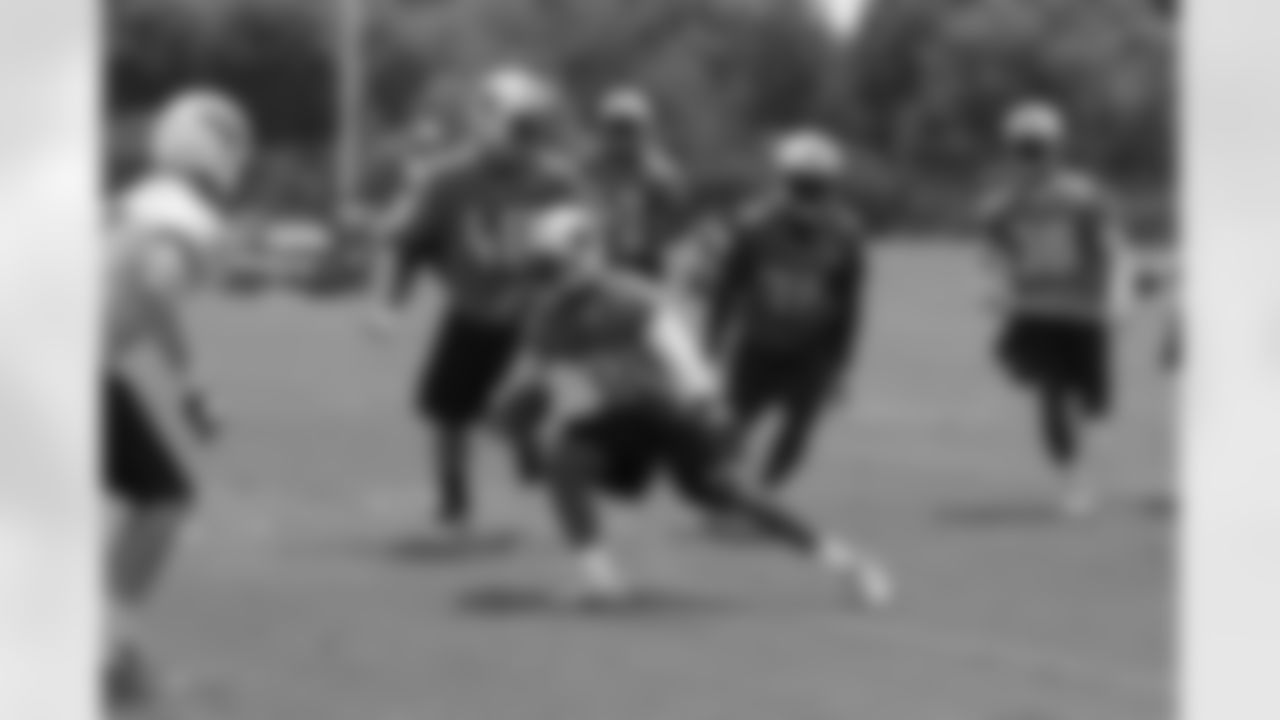 Titans players practice outside during Thursday's organized training activity (OTA) at Baptist Sports Park in Nashville, Tenn.