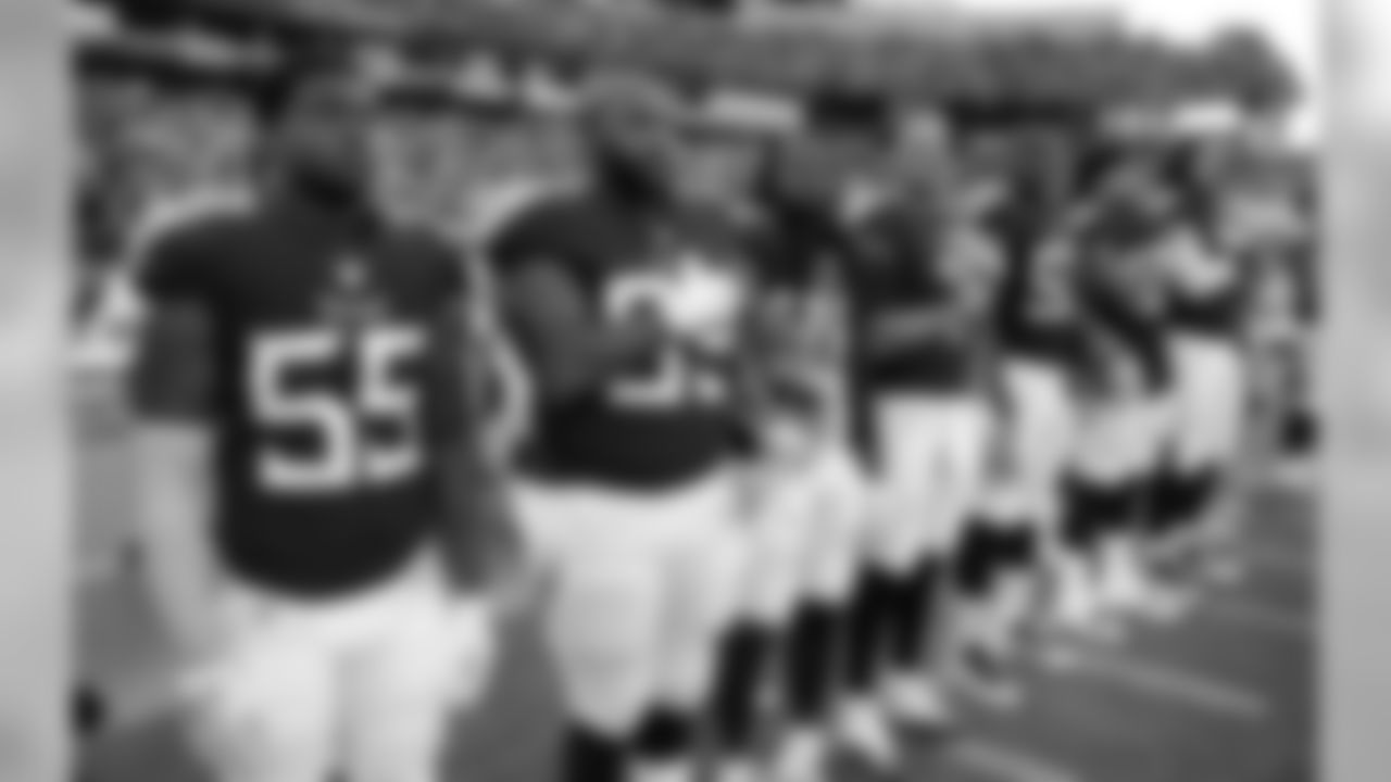 Tennessee Titans payers, including Jayon Brown (55) and Jurrell Casey (99) stand for the national anthem before a preseason NFL football game against the Tampa Bay Buccaneers Saturday, Aug. 18, 2018, in Nashville, Tenn. (AP Photo/James Kenney)