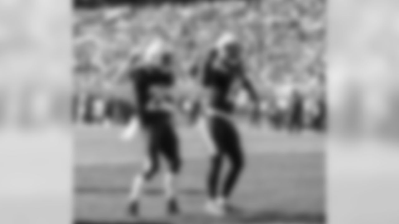 Melvin Gordon and Keenan Allen dance in the end zone after one of Gordon's touchdowns during the Week 6 matchup against the Cleveland Browns.