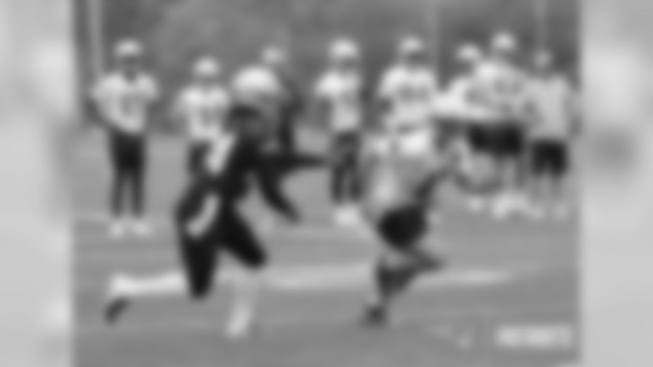 Stephon Gilmore (24) and Julian Edelman (11)