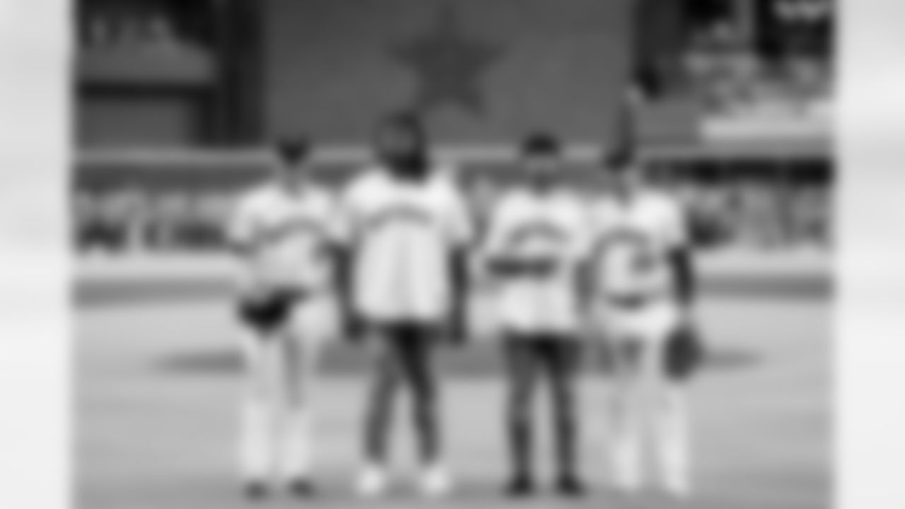 An image from rookies Derek Stingley Jr. and Kenyon Green throwing out the first pitch at the Astros game at Minute Maid Park in Houston, TX.