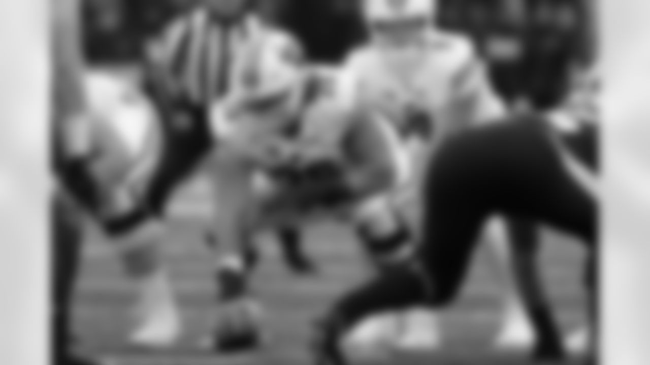 Wisconsin offensive lineman Joe Tippmann (75) gets set to snap the ball during the first half of an NCAA college football game against Iowa, Saturday, Nov. 12, 2022, in Iowa City, Iowa. (AP Photo/Charlie Neibergall)