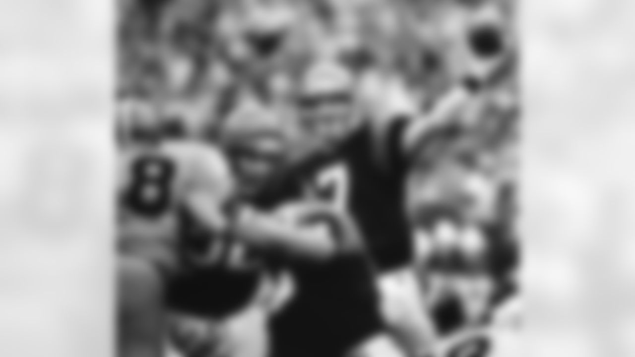 Cincinnati Bengals quarterback Boomer Esiason unleashes a pass during their game with the Cleveland Browns at Riverfront Stadium in Cincinnati, Nov. 11, 1985. Esiason was 23 for 33 with 262 yards and one touchdown pass in the Bengals 27-10 win. (AP Photo/Jim Callaway)