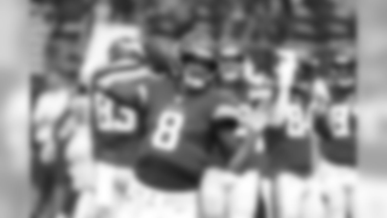 Minnesota Vikings quarterback Kirk Cousins warms up before an NFL preseason football game against the Arizona Cardinals, Saturday, Aug. 24, 2019, in Minneapolis. (AP Photo/Bruce Kluckhohn)