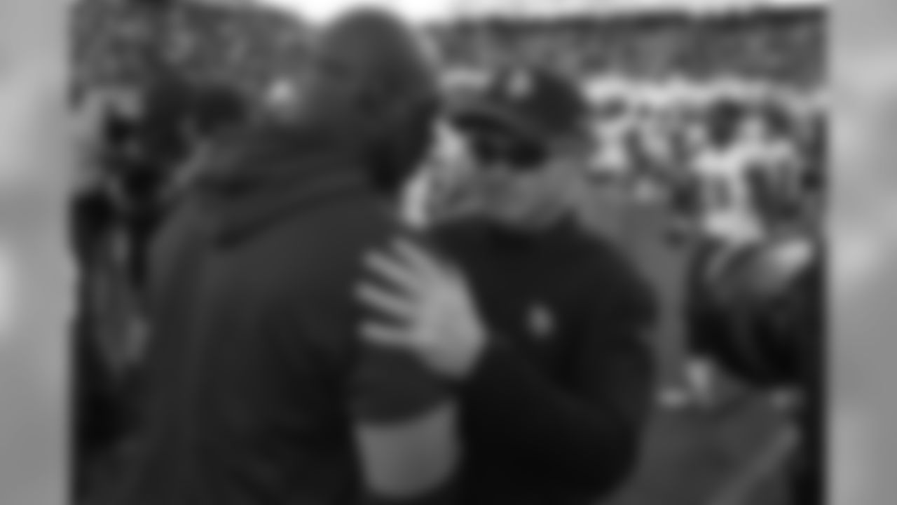 Los Angeles Chargers head coach Anthony Lynn, left, greets Minnesota Vikings head coach Mike Zimmer after an NFL football game Sunday, Dec. 15, 2019, in Carson, Calif. (AP Photo/Kelvin Kuo)