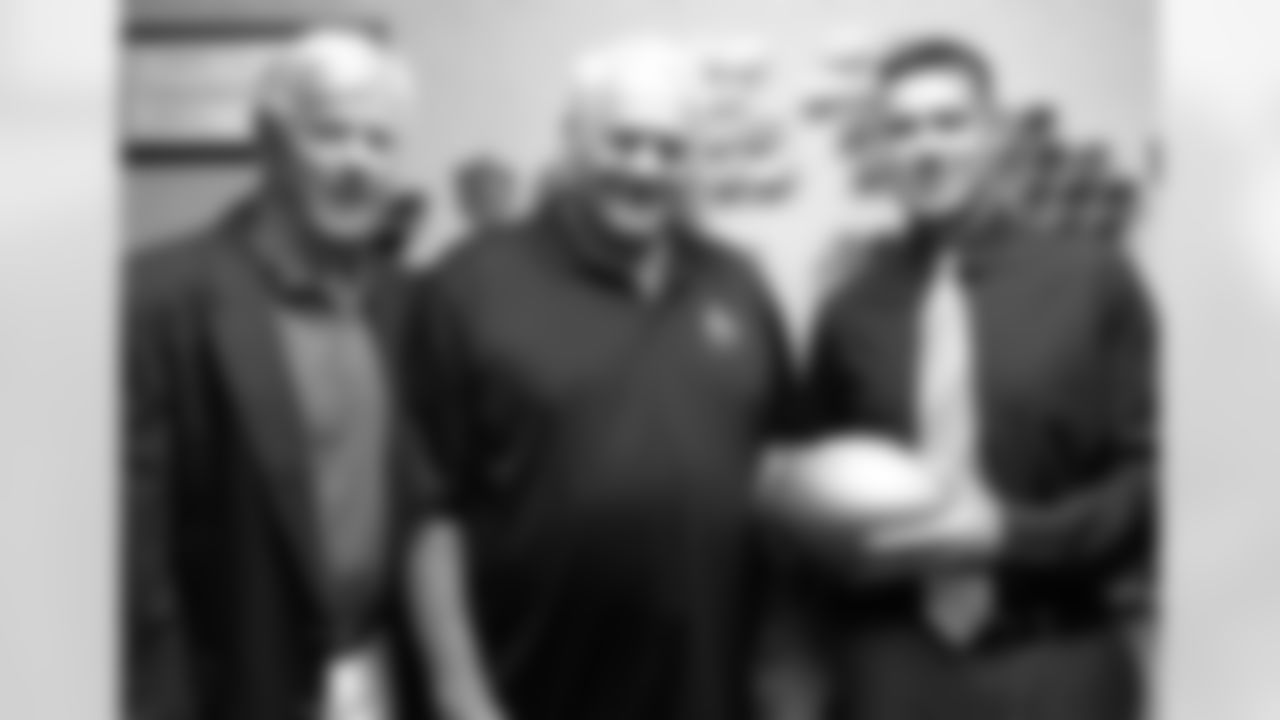 IMAGE DISTRIBUTED FOR NATIONAL FOOTBALL LEAGUE - Mick Tingelhoff, 2015 NFL Hall of Fame Inductee, center, presents the Super Bowl High School Honor Roll Wilson Golden Football to Phil Traux, Lexington High School Activities Director, right, and teammate and longtime friend Steve Smith Saturday, July 18, 2015, in Lexington, Neb. Tingelhoff was honored by his hometown in recognition of his football career with the Nebraska Cornhuskers and the Minnesota Vikings. Tingelhoff, a six-time Pro Bowl selection, played in four Super Bowls with the Vikings. (Bill Wolf/AP Images for National Football League)
