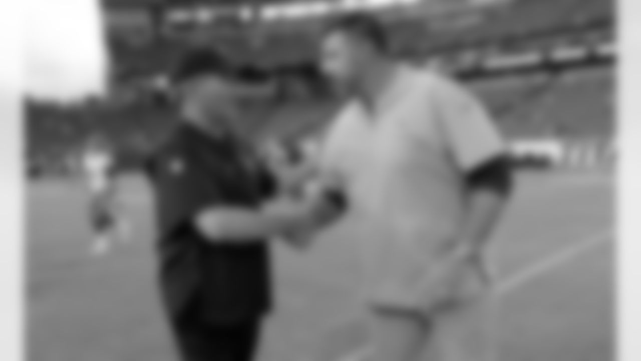 Minnesota Vikings head coach Mike Zimmer, left, greets Tennessee Titans head coach Mike Vrabel, right, before a preseason NFL football game Thursday, Aug. 30, 2018, in Nashville, Tenn. (AP Photo/Mark Zaleski)