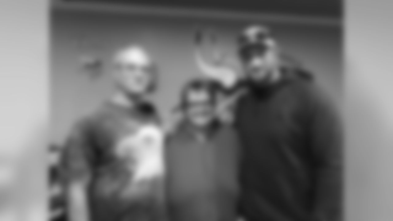 Brian surprised Tim and Diane Pries, neighbors of Pat Reeve near Kellogg, Minnesota, and was happy to sign their Vikings wall.