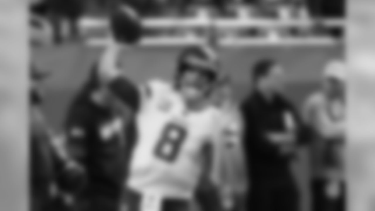 Minnesota Vikings quarterback Kirk Cousins throws during pregame of an NFL football game against the Detroit Lions, Sunday, Oct. 20, 2019, in Detroit. (AP Photo/Duane Burleson)