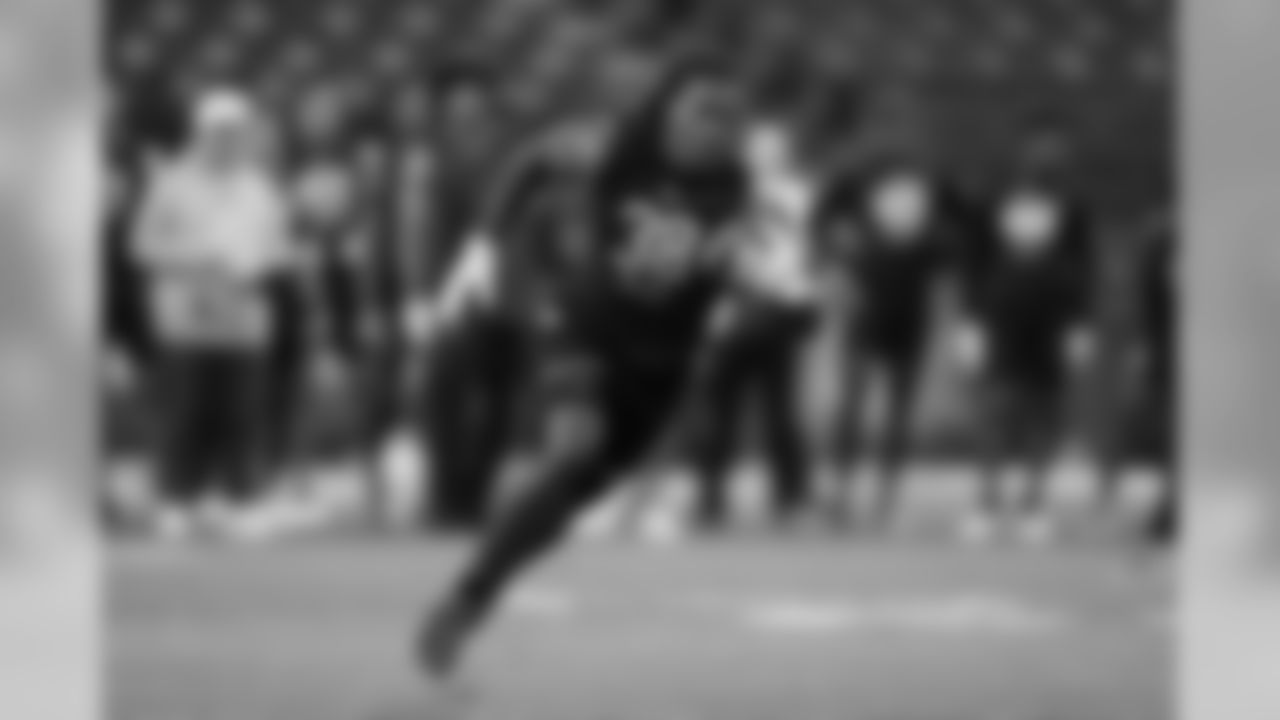 Miami wide receiver K J Osborn runs a drill at the NFL football scouting combine in Indianapolis, Thursday, Feb. 27, 2020. (AP Photo/Charlie Neibergall)