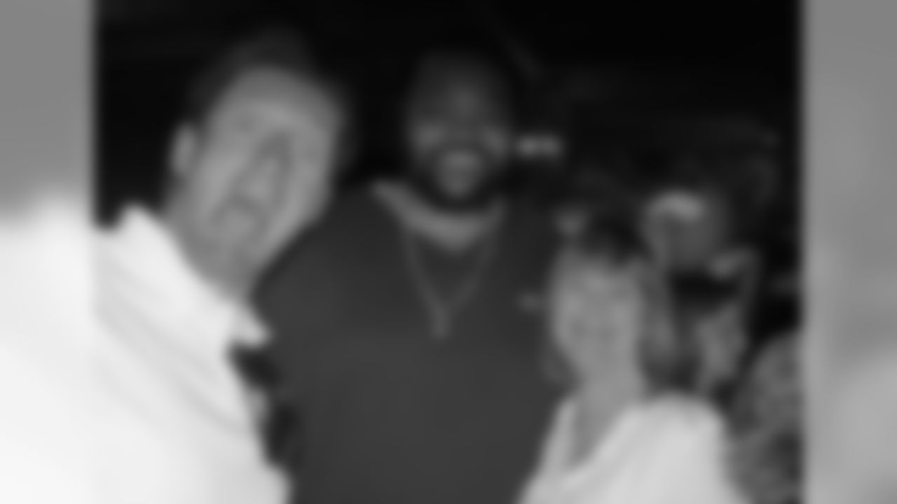 Nancy Gilbertson at a fundraiser with Brian and former Vikings right tackle Phil Loadholt