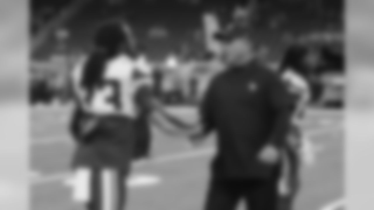 Minnesota Vikings head coach Mike Zimmer meets with running back Dalvin Cook (33) during pregame of an NFL football game against the Detroit Lions, Sunday, Oct. 20, 2019, in Detroit. (AP Photo/Duane Burleson)