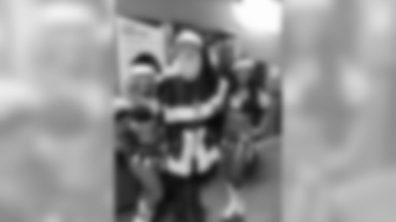 Bumped into Santa as he was on his way back to the North Pole! Kelly and I put in a request for a Vikings win. :)