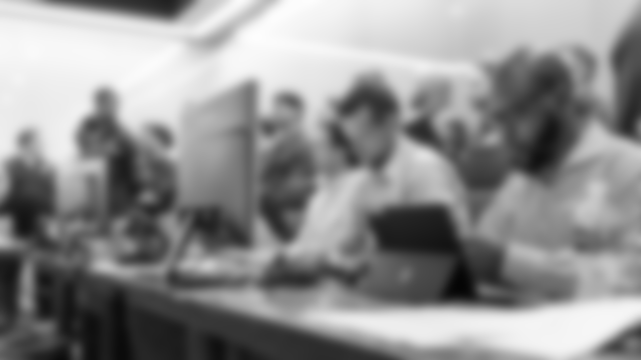 Director of Scouting Brandon Hunt at the far right of the table with Director of Player Personnel Alan Wolking to his left
