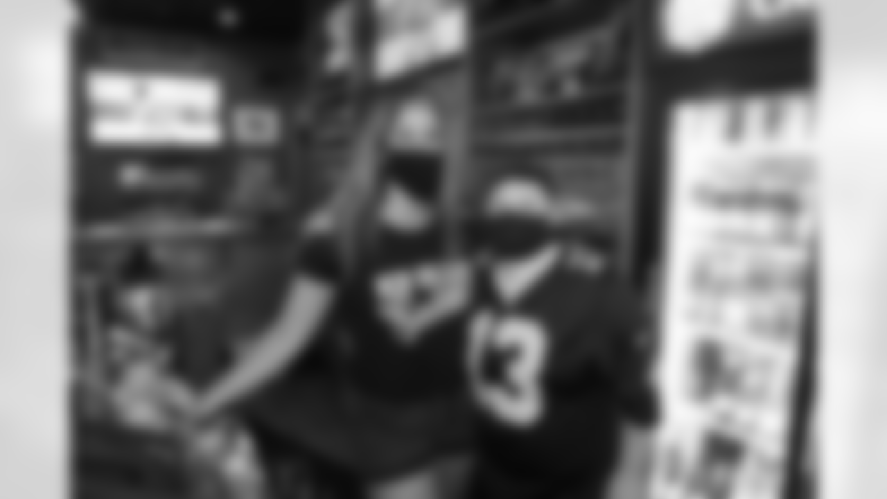 New Orleans Saints fans cheer on the team from the Times Grill in Mandeville as the Saints take on the Tampa Bay Buccaneers in week 1 of the 2020 NFL season.