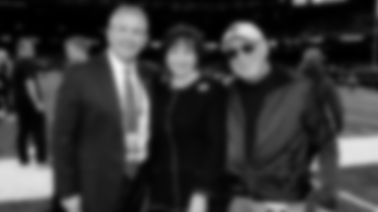 A frequent guest at Training Camp and home games, the New Orleans Saints remember music legend and fan Jimmy Buffett who passed away at the age of 76 on September 1, 2023, photographed here alongside Gayle Benson, owner and chief executive officer of the Saints, and Greg Bensel, senior vice president of communications of the Saints.