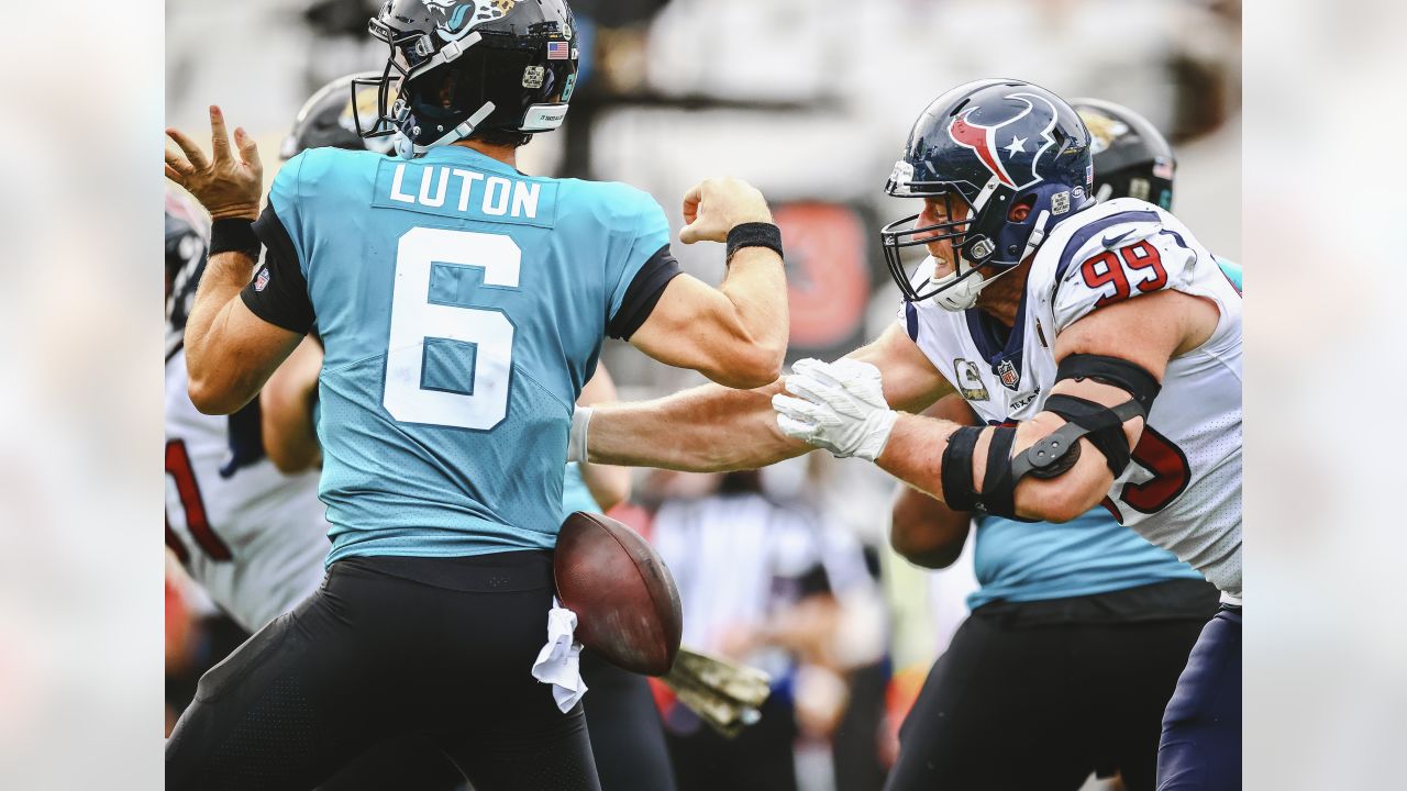 Houston Texans - Houston Texans defensive end J.J. Watt shows his Salute to  Service gloves as he warms up before the Week 9 win over Buffalo.