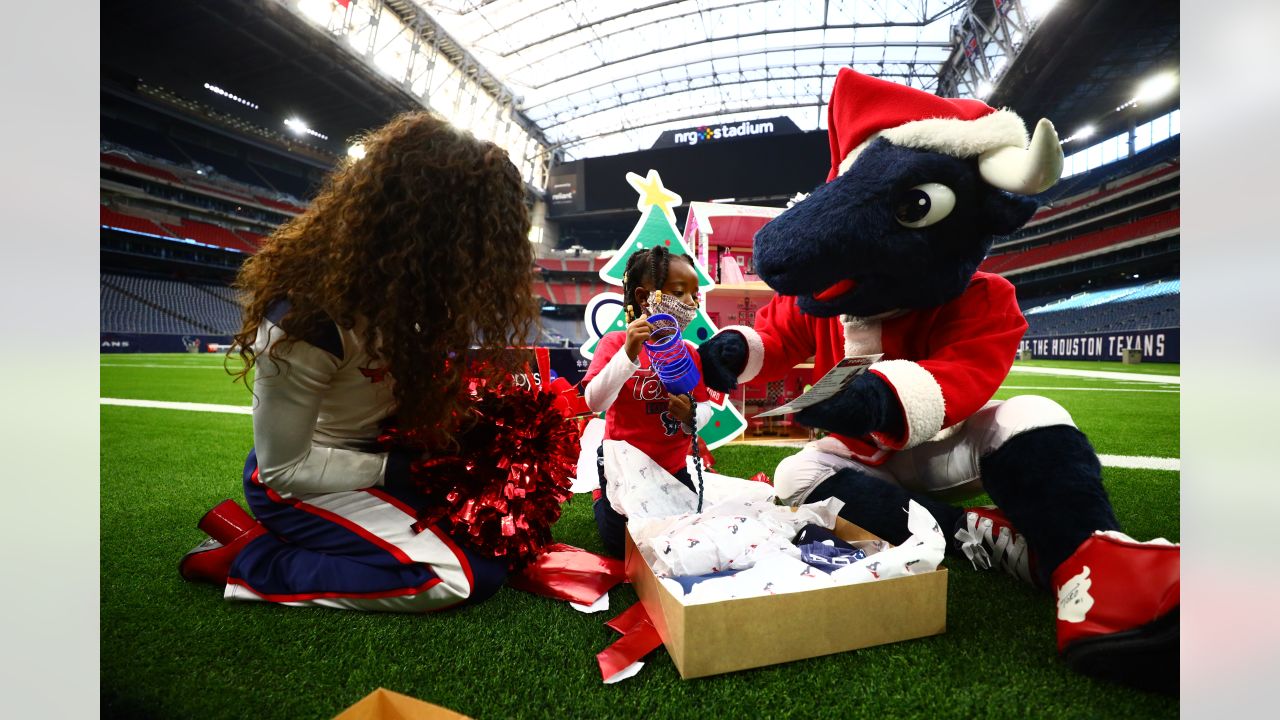 December 8, 2019: Houston Texans mascot Toro wears a Santa Claus outfit  during the 3rd quarter of an NFL football game between the Denver Broncos  and the Houston Texans at NRG Stadium