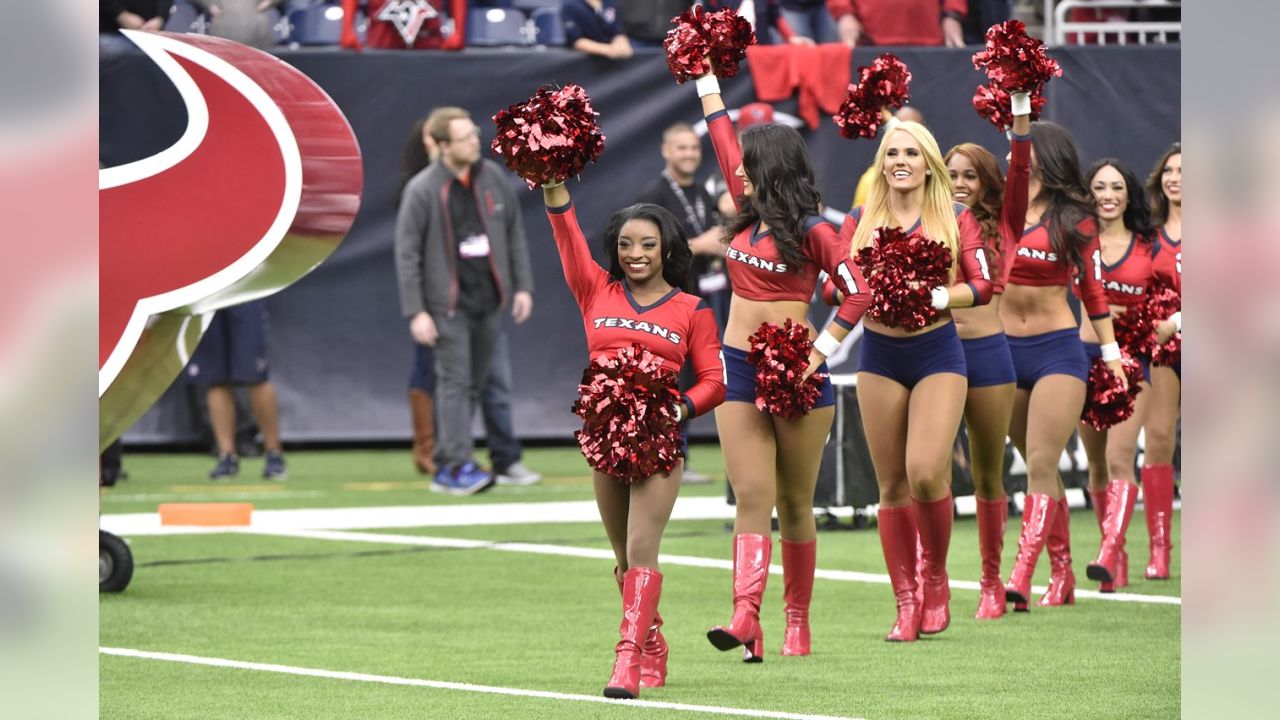 Simone Biles appears as guest Texans cheerleader