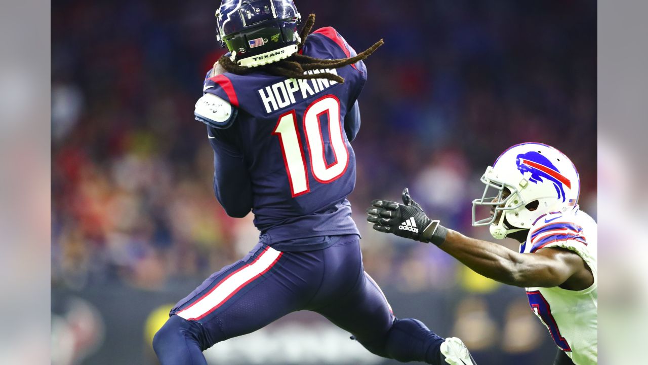 Houston Chronicle Sports - Houston Texans quarterback Deshaun Watson flexes  in celebration after connecting with running back Taiwan Jones to set up  the winning field goal in overtime of their 22-19 AFC