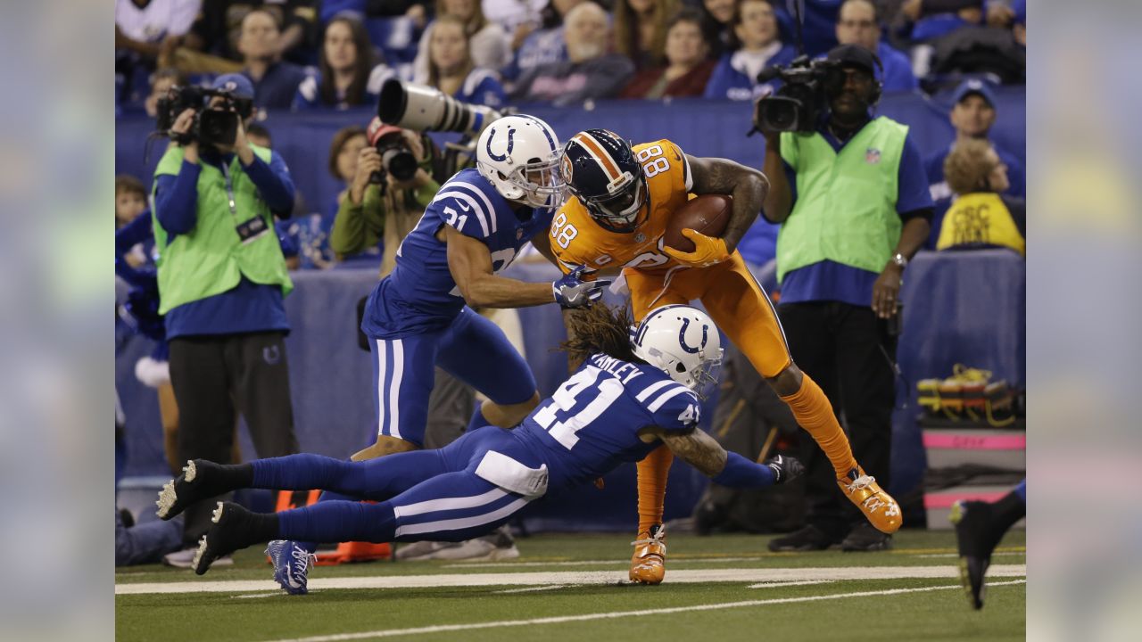 Cincinnati Bengals wide receiver A.J. Green (18) celebrates a touchdown in  front of Indianapolis Colts cornerback Quincy Wilson (31) during the second  half of an NFL football game in Indianapolis, Sunday, Sept.