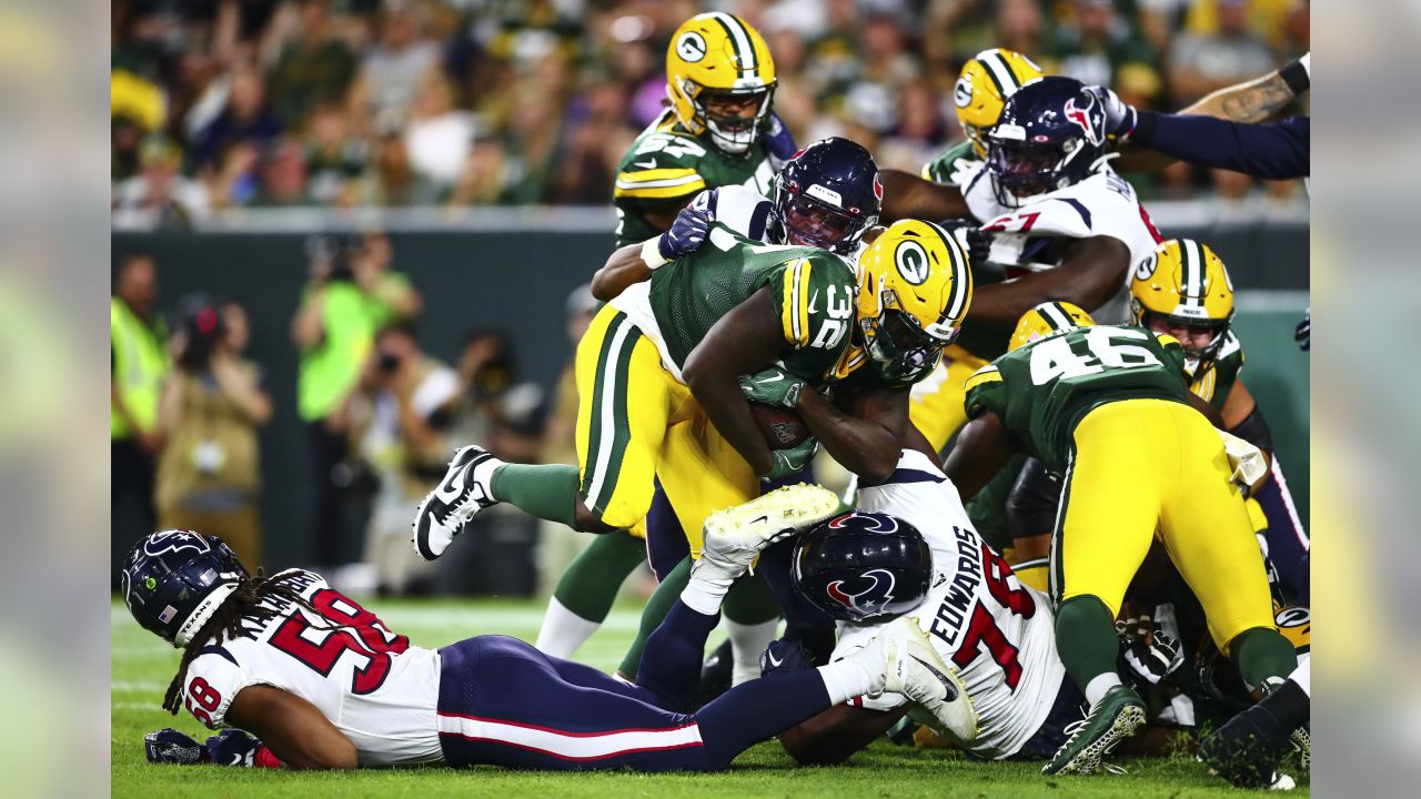 PACKERVILLE, U.S.A.: Texans at Packers Game Photos