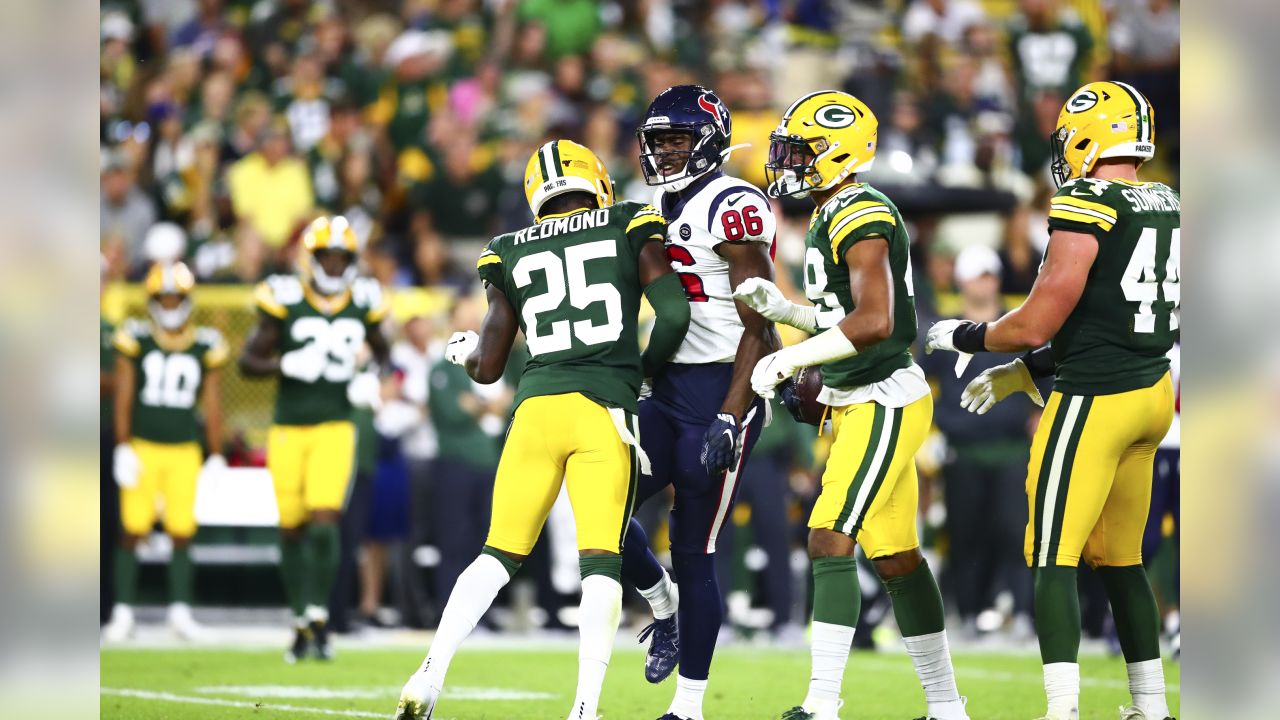 PACKERVILLE, U.S.A.: Texans at Packers Game Photos