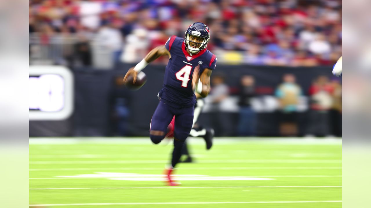 Houston Chronicle Sports - Houston Texans quarterback Deshaun Watson flexes  in celebration after connecting with running back Taiwan Jones to set up  the winning field goal in overtime of their 22-19 AFC