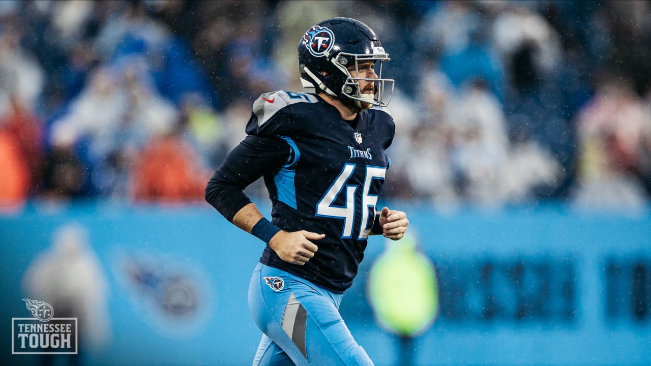 Tennessee Titans long snapper Morgan Cox (46) celebrates as he runs off the  field after the team's NFL football game against the Green Bay Packers,  Thursday, Nov. 17, 2022, in Green Bay