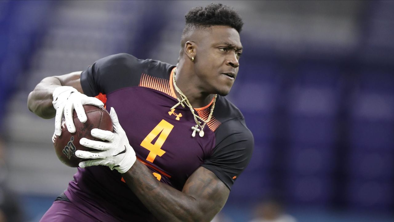 NFC wide receiver CeeDee Lamb of the Dallas Cowboys tosses a ball to a  teammate during Pro Bowl NFL football practice, Friday, February 4, 2022,  in Las Vegas. (Gregory Payan/AP Images for