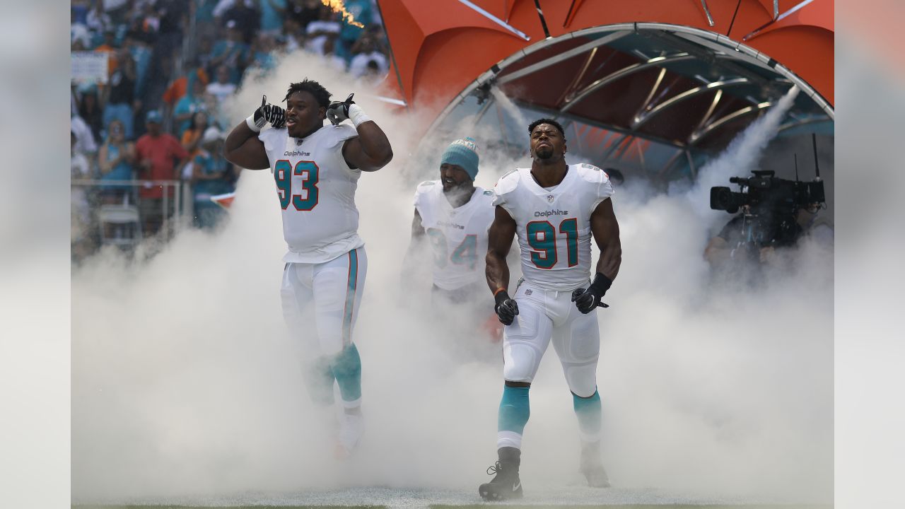 Randy Starks of the Miami Dolphins sacks Tom Brady of the New England  Patriots in the second quarter on Monday, September 12, 2011, at Sun Life  Stadium in Miami Gardens, Florida. (Photo