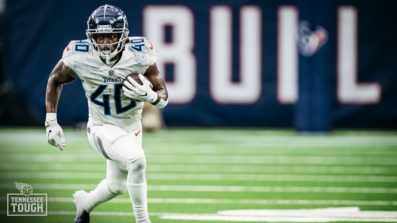 Tennessee Titans running back Dontrell Hilliard (40) celebrates a touchdown  with guard Aaron Brewer (55) during