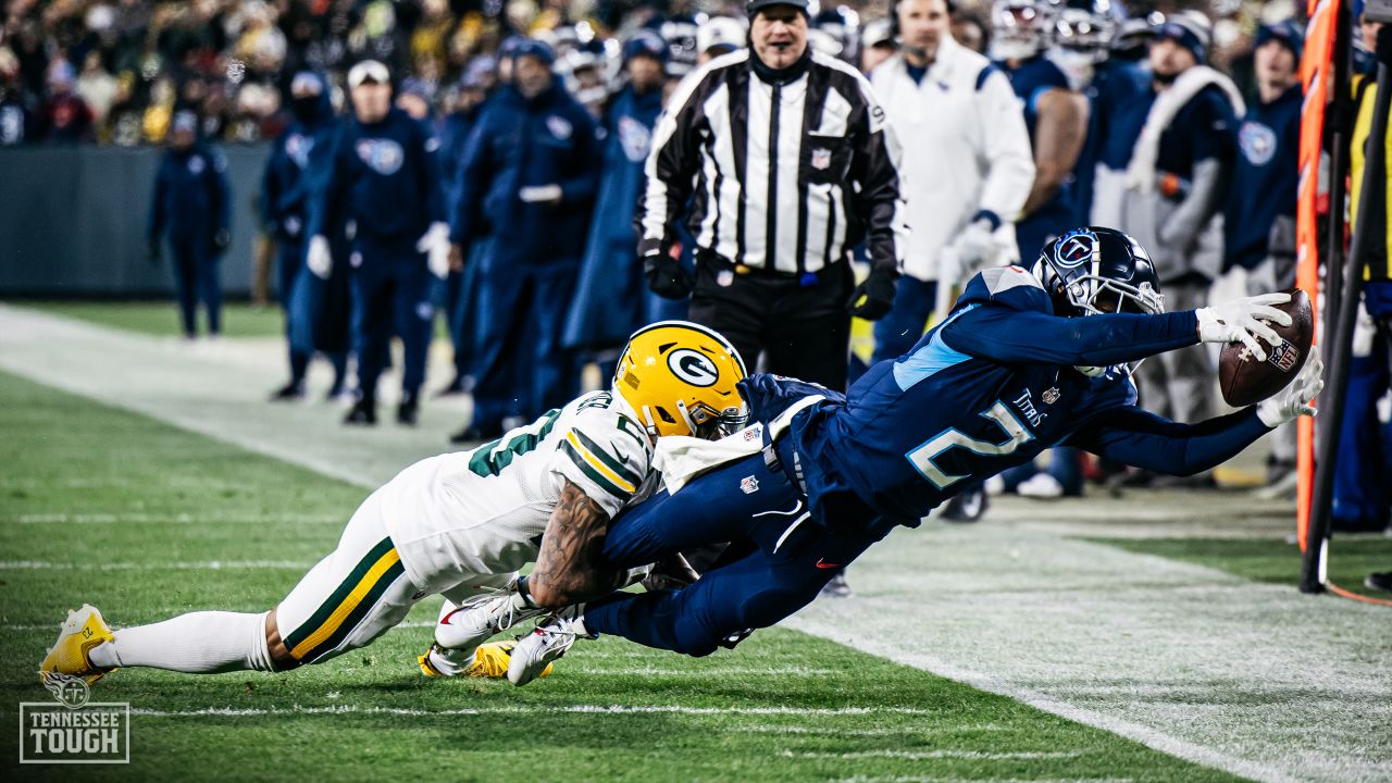 Detailed view of Green Bay Packers (left) and Tennessee Titans helmets.  Photo via Credit: Newscom/Alamy Live News Stock Photo - Alamy