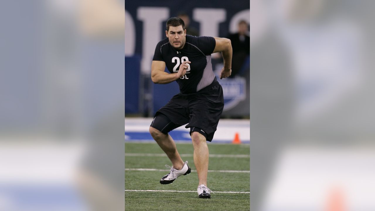 Tennessee Titans offensive tackle Troy Kropog talks on the phone in the  Titans' locker room at their practice facility on Monday, Jan. 3, 2011, in  Nashville, Tenn. Players cleaned out their lockers