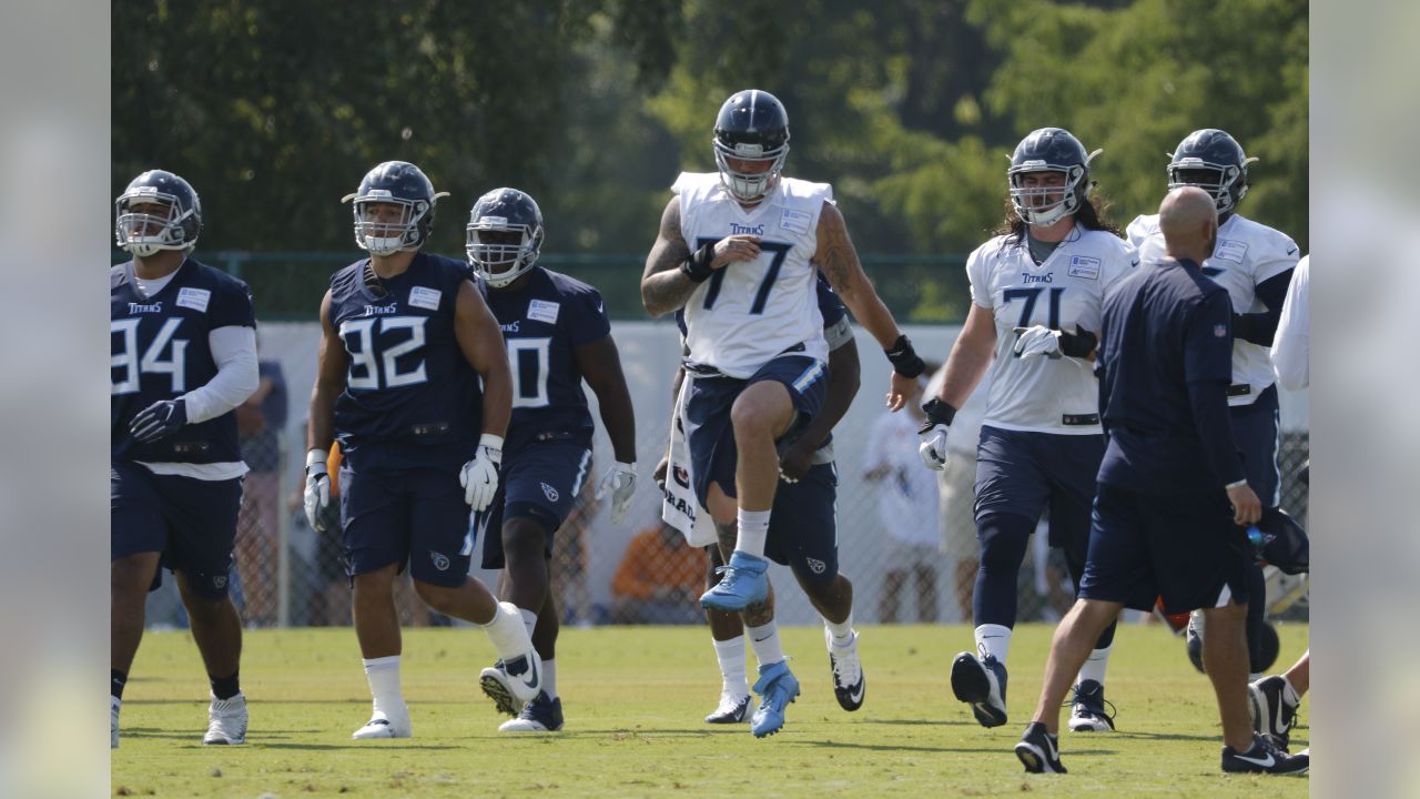 Lewan reports for preseason camp